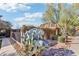 Landscaped grounds with cactus and iron fencing at 19777 N 76Th St # 2263, Scottsdale, AZ 85255