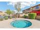 Community hot tub surrounded by landscaping at 19777 N 76Th St # 2263, Scottsdale, AZ 85255