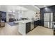 Modern kitchen with dark cabinetry and white countertops at 19777 N 76Th St # 2263, Scottsdale, AZ 85255