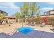 Community pool and patio with lounge chairs at 19777 N 76Th St # 2263, Scottsdale, AZ 85255