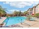 Large community pool with plenty of lounge chairs at 19777 N 76Th St # 2263, Scottsdale, AZ 85255