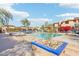 Inviting community pool with lounge chairs and lush landscaping at 19777 N 76Th St # 2263, Scottsdale, AZ 85255