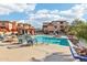 Community pool area with surrounding buildings at 19777 N 76Th St # 2263, Scottsdale, AZ 85255