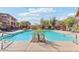 Inviting community pool with surrounding lounge chairs at 19777 N 76Th St # 2263, Scottsdale, AZ 85255