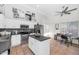 Modern kitchen with white cabinets, stainless steel appliances, and an island at 20234 N 71St Ln, Glendale, AZ 85308