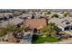 Aerial view of a single-story house with a well-maintained lawn and driveway at 20838 N 101St Dr, Peoria, AZ 85382