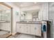 Modern bathroom with double vanity and walk-in shower at 20838 N 101St Dr, Peoria, AZ 85382