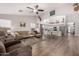 Bright and airy living room with hardwood floors and open floor plan at 20838 N 101St Dr, Peoria, AZ 85382