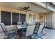 Covered patio with table and chairs, ideal for dining at 20838 N 101St Dr, Peoria, AZ 85382