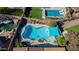 Inviting freeform pool with a blue shade sail at 20838 N 101St Dr, Peoria, AZ 85382