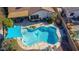 An alluring pool with a sunshade and comfortable lounge chairs at 20838 N 101St Dr, Peoria, AZ 85382