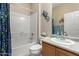 Bathroom with tub, shower, and wood vanity at 21816 N 261St Ave, Buckeye, AZ 85396