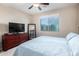 Bedroom with king-size bed and large dresser at 21816 N 261St Ave, Buckeye, AZ 85396