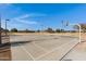 Outdoor basketball court with lights at 22085 E Rosa Rd, Queen Creek, AZ 85142