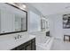 Elegant bathroom with a soaking tub and double vanity at 22085 E Rosa Rd, Queen Creek, AZ 85142