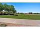 Green grassy area with walking path at 22085 E Rosa Rd, Queen Creek, AZ 85142