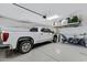 Garage with overhead storage and GMC truck at 22085 E Rosa Rd, Queen Creek, AZ 85142