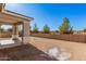 Large backyard with a block wall and desert landscaping at 23472 S 210Th St, Queen Creek, AZ 85142