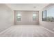 Bright bedroom featuring neutral walls and carpet flooring at 23472 S 210Th St, Queen Creek, AZ 85142