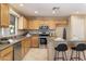 Modern kitchen featuring stainless steel appliances and island at 23618 W Adams St, Buckeye, AZ 85396