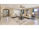 Living room with neutral-toned furniture and entryway view at 23618 W Adams St, Buckeye, AZ 85396