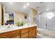 Double vanity bathroom with a large mirror and a shower/tub combo at 26247 N El Prado --, Rio Verde, AZ 85263