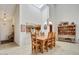 Dining area with a wooden table and access to kitchen at 26247 N El Prado --, Rio Verde, AZ 85263