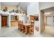 Bright dining room with a wooden table and view of the kitchen at 26247 N El Prado --, Rio Verde, AZ 85263