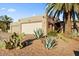 Desert landscaping surrounds this single-level home with a two-car garage at 26247 N El Prado --, Rio Verde, AZ 85263