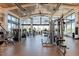 Modern fitness center with various equipment and large windows at 26247 N El Prado --, Rio Verde, AZ 85263