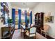 Bright dining room with wood table and blue accents at 27931 N Montana Dr, Rio Verde, AZ 85263