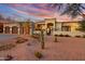 Beautiful desert home with 3-car garage at sunset at 27931 N Montana Dr, Rio Verde, AZ 85263