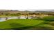 Expansive golf course with lake and mountain views at 27931 N Montana Dr, Rio Verde, AZ 85263