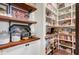 Walk-in pantry offers extensive shelving for food storage at 27931 N Montana Dr, Rio Verde, AZ 85263