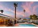 Sunset view of the backyard pool and patio at 2923 N 81St Pl, Scottsdale, AZ 85251