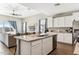 Modern kitchen with granite countertops and white cabinetry at 29681 W Columbus Ave, Buckeye, AZ 85396