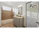 Bathroom with granite vanity, tiled shower, and bathtub at 30600 N Pima Rd # 63, Scottsdale, AZ 85266