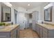 Double vanity bathroom with granite countertops at 30600 N Pima Rd # 63, Scottsdale, AZ 85266