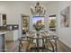 Bright breakfast nook with a wooden table and chairs near the kitchen at 30600 N Pima Rd # 63, Scottsdale, AZ 85266