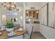 Dining area with built-in wet bar and chandelier at 30600 N Pima Rd # 63, Scottsdale, AZ 85266