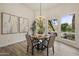 Elegant dining room with chandelier and large windows at 30600 N Pima Rd # 63, Scottsdale, AZ 85266