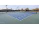 Tennis court with desert landscape backdrop at 30600 N Pima Rd # 63, Scottsdale, AZ 85266