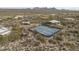 Two well-lit tennis courts in a desert setting at 30600 N Pima Rd # 63, Scottsdale, AZ 85266