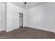 Simple bedroom with carpet flooring and a closet at 3210 W Stradling Ave, Apache Junction, AZ 85120