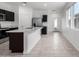 Modern kitchen with stainless steel appliances and marble countertops at 3210 W Stradling Ave, Apache Junction, AZ 85120