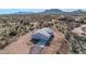 Aerial view of single-story house, showcasing desert landscape at 35810 E 138Th Pl, Scottsdale, AZ 85262