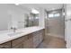 Double vanity bathroom with a large walk in shower at 35810 E 138Th Pl, Scottsdale, AZ 85262