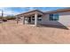 House exterior showcasing a covered patio area at 35810 E 138Th Pl, Scottsdale, AZ 85262