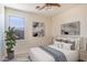 Comfortable bedroom with a queen-size bed and neutral decor at 3731 E Fruitvale Ave, Gilbert, AZ 85297