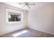 Bedroom with ceiling fan and window seat at 3731 E Fruitvale Ave, Gilbert, AZ 85297